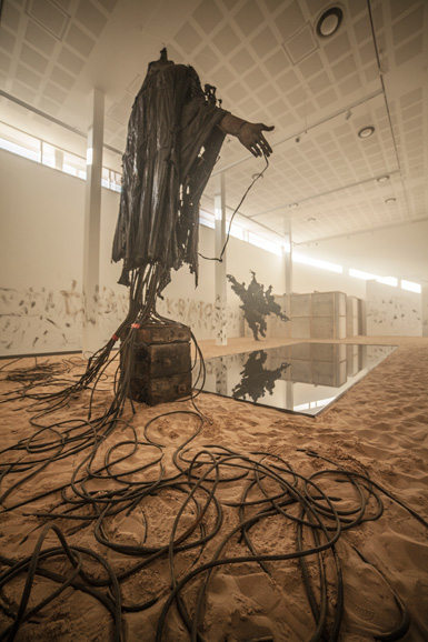 view of oilpool, 'Casting a Dark Democracy' by Tim Shaw